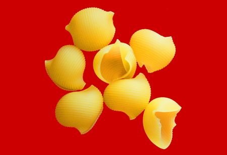 Pasta on the red backgroundの写真素材