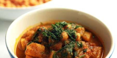 Simple vegetable soup. European cuisine. Chickpeas, potato and carrot. Organic food. Vegan dish. Vegetarian lunch. Wide photo.の写真素材