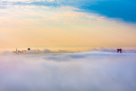 World Famous Golden Gate Bridge Surrounded by Fog after Sunrise in San Francisco,Californiaの写真素材