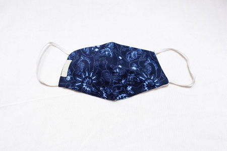 design for face mask  with random plants pattern black base color  and white backgroundの写真素材