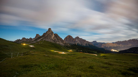 Gusela mountain in a starry night with clouds, Giau pass, Dolomites, Veneto, Italyの写真素材