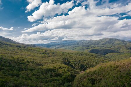 Green hills and blue sky with clouds. Background imagen of nature. Parque Natural Municipal Das...