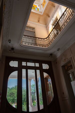 MENDOZA, ARGENTINA - NOVEMBER 16, 2019: Vertical long shot of the interior in Stoppel mansion, Mendoza, Argentina. In 2018 -after 37 years closed- this mansion was restored to become "Carlos Alonso" museumのeditorial素材