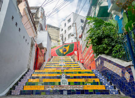 RIO DE JANEIRO, BRAZIL - JANUARY 3, 2020:  The famous Stairway Selaron (Escadaria Selaron) covered...