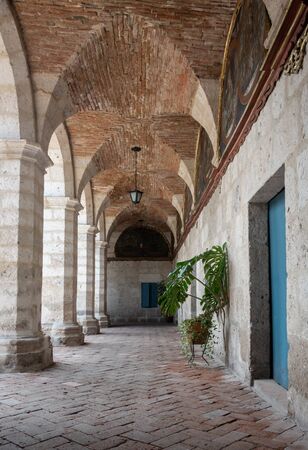 Vertical shot of archway corridor in Monastery of Santa Catalina, Arequipa. This convent was founded in 1580の写真素材