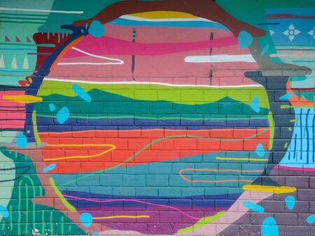 Street art abstract background with frame and copy space. Colorful grafitti on the wallの写真素材