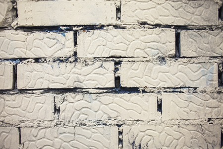 wall of bricks painted white textureの写真素材