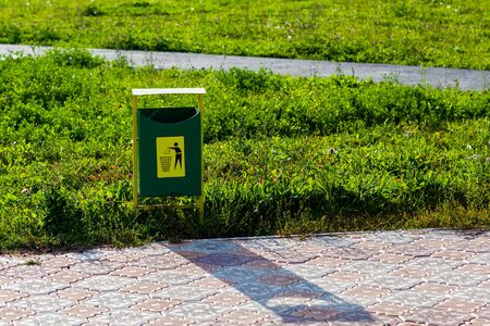 garbage can in a parkの写真素材