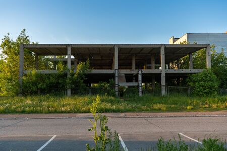 Concrete frame of an abandoned hospital building in Russiaの写真素材