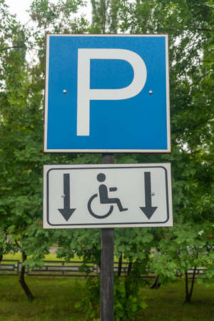 Traffic sign used to reserve parking spots for disabled persons.の写真素材