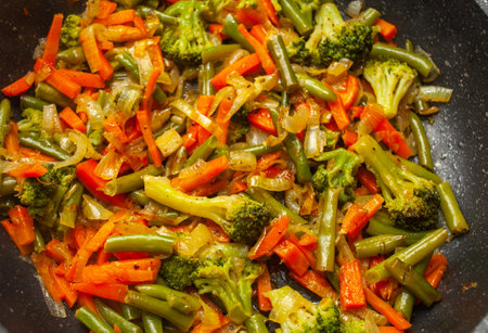 fried vegetables in a pan, top viewの写真素材