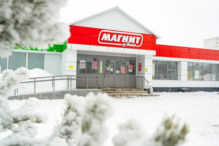 Agidel, Russia Republic of Bashkortostan - February 04, 2021: Signboard of MAGNITE Supermarketのeditorial素材