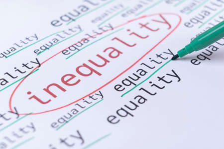 Gender equality concept, hand underlines with green marker the word EQUALITY. Selective focusの写真素材