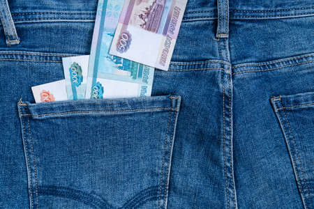Russian ruble banknotes in the back pocket of jeans. Salary conceptの写真素材