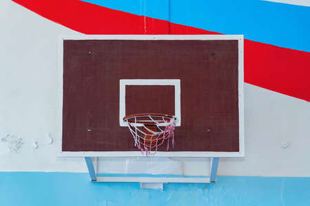 Square Basketball hoop in the gym of the Russian school. A wall with the colors of the Russian flagの写真素材