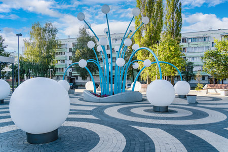 Modern light fountain with large white balls in the city park: 27 August 2021 Agidel, Russiaのeditorial素材
