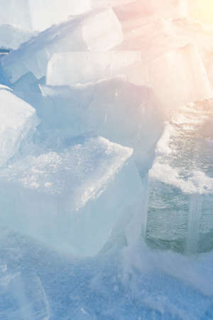 ice blocks lying on the snow. selective focus