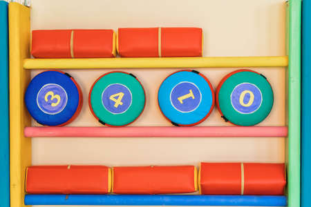 Swedish wall with sports equipment in the kindergarten gymの写真素材