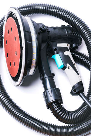 Electric rotary grinder on a white backgroundの写真素材