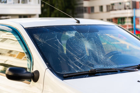 Broken car windshield, car involved in an accidentの写真素材