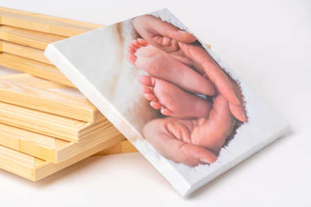 Photo printed on canvas and stretched on a stretcher in frame workshopの写真素材
