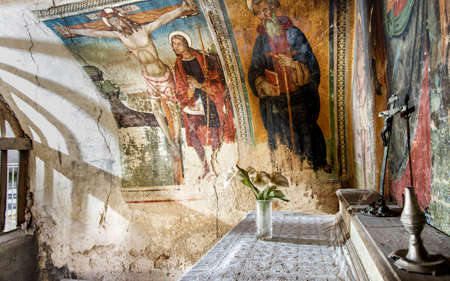 Cammoro, Umbria, Italy, February 7 2019, ancient frescoes in a small votive chapel along the ancient via della Spinaのeditorial素材