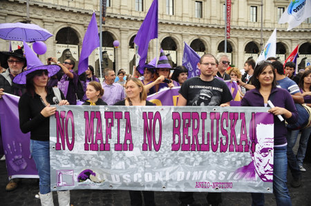 protest against the policies of Silvio Berlusconi's government on the streets of Rome on October 2, 2009, women and young people protest against corruptionのeditorial素材