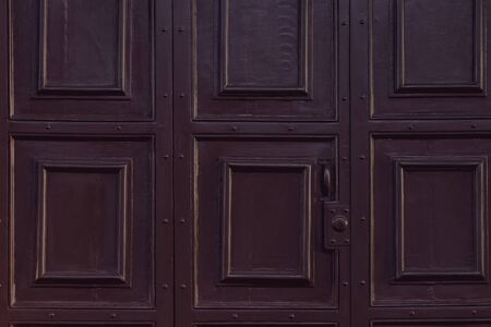 Dark brown wood gate door background. classic gate door. vintageの写真素材