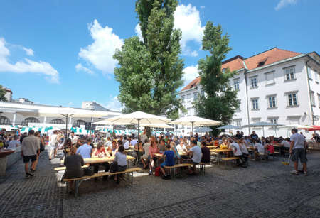Odprta kuhna (Open Kitchen) food market, located at Pogaarjev trg square in the heart of Ljubljana, Sloveniaのeditorial素材