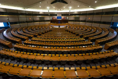 European Parliament Assembly Room. European Parliament hemicycle in Brussels. EP is the directly elected parliamentary institution of the European Union. Empty debating chamber.のeditorial素材