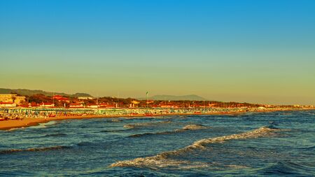 beautiful sunset view on forte dei marmi beachの写真素材