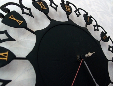 Wall clock with hands with Roman Numeralsの写真素材