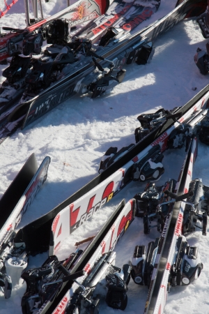 Skis left on the snow from people at lunch time near an alpine refugeのeditorial素材