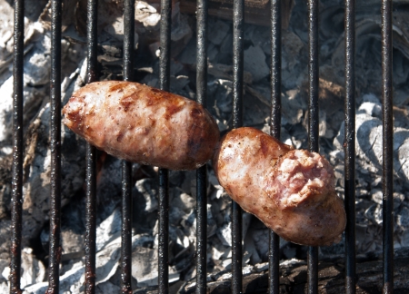 Sausages on the grill in open air.の写真素材