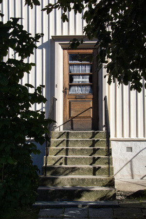 Entrance of typical swedish wood house , with stairsの写真素材