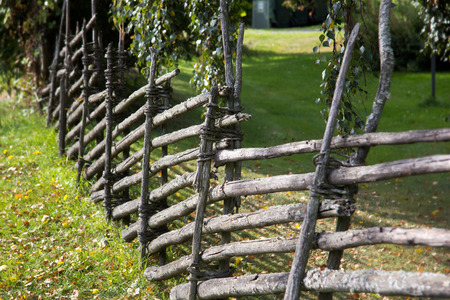 Detail of typical Swedish diagonal wood fence,の写真素材