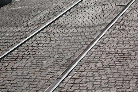 Old tracks across cobbles pavements. Picture taken in Gothemburg, Swedenの写真素材