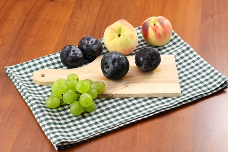 Fruits grapes, plums and peachesの写真素材
