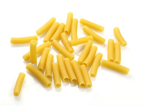Raw Pasta - Sedani Rigati on white backgroundの写真素材