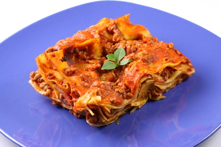 Plate with Lasagne on white backgroundの写真素材