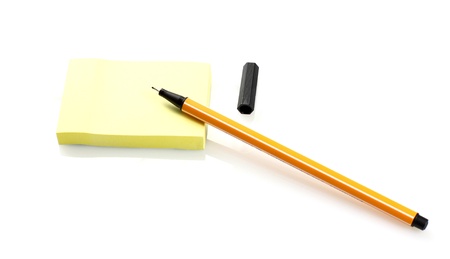 Post-It with pen on white backgroundの写真素材