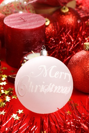 Christmas decorations: Red balls and candleの写真素材