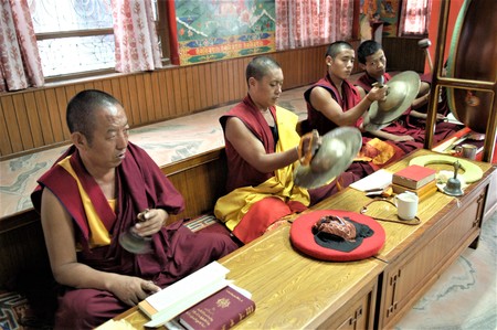 NEPAL, KATHMANDU BUDDHIST MONKS PRAYING INSIDE A BUDDHIST TEMPLEのeditorial素材