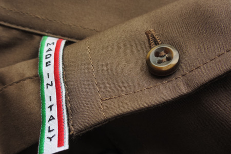 Made in Italy label on brown cotton shirtの写真素材