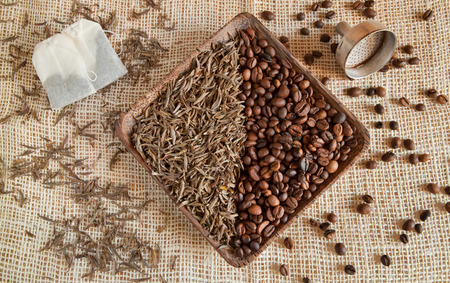 dried tea leaves and roasted coffee beans: theine vs caffeineの写真素材