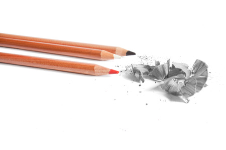 Black, white and red  pencils in white backgroundの写真素材