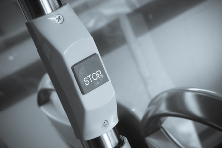Stop on request button on bus