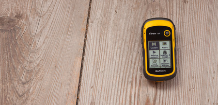 AHRNTAL (BZ), ITALY - OCTOBER 11, 2014: GPS Garmin receiver is recordind positioning log over a ...
