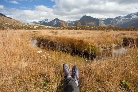 Relaxing next to the mountain stream
