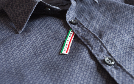 Made in Italy label on blue cotton shirtの写真素材